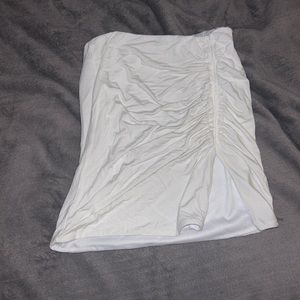 Small white mini skirt (stretches)